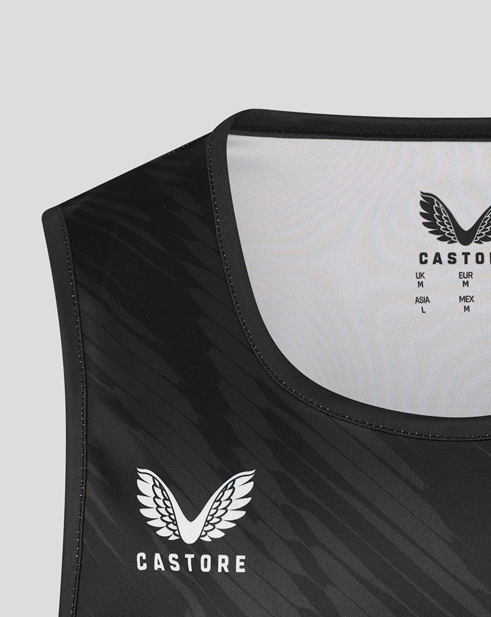 Close-up of black Leicester Tigers vest chest showing Castore logo and tiger head emblem