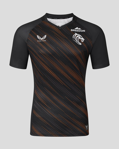 Front view of Leicester Tigers Men's 25/26 Warm Up Jersey in black with orange diagonal pattern and Breedon sponsor
