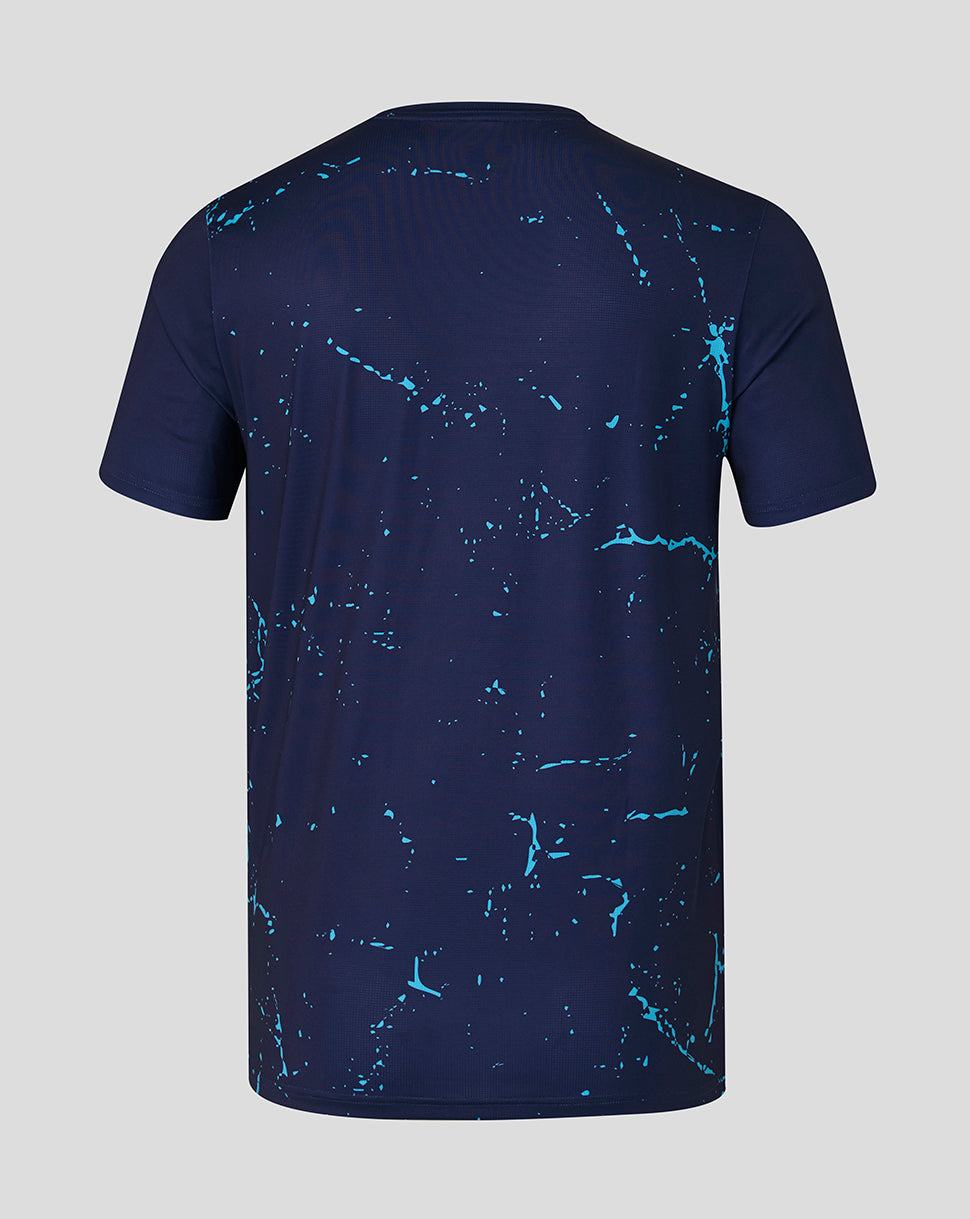 Back view of navy Yorkshire short sleeve performance tee with turquoise splatter pattern.