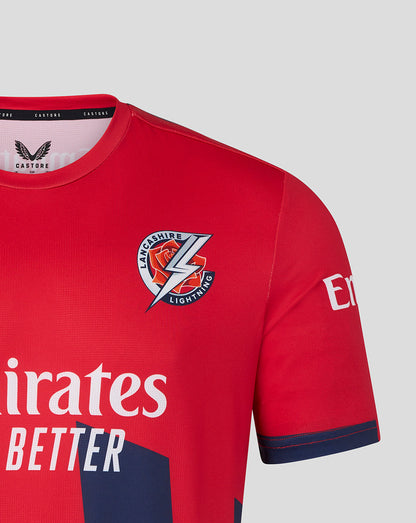 Red sports jersey with branding and logo on a gray background