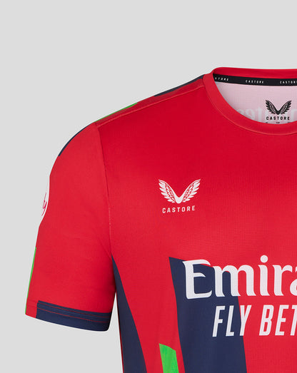 Red sports jersey with visible branding on a gray background