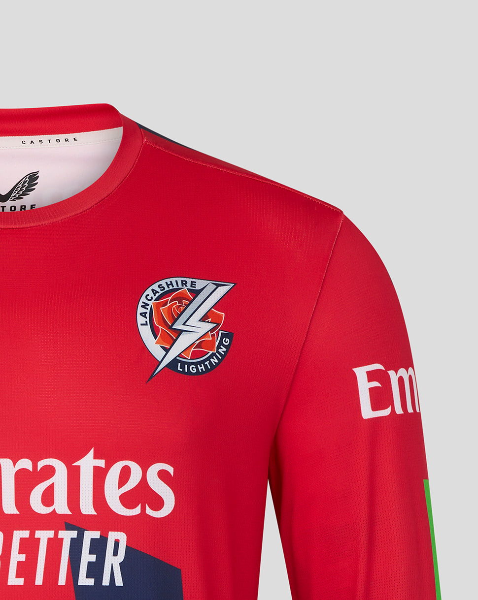 Red sports jersey with branding and logos on a gray background