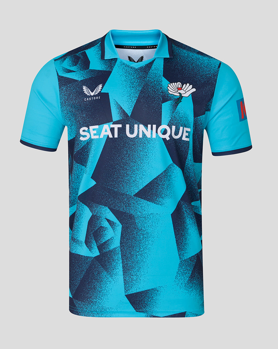 Blue sports jersey with geometric pattern and visible branding on a gray background