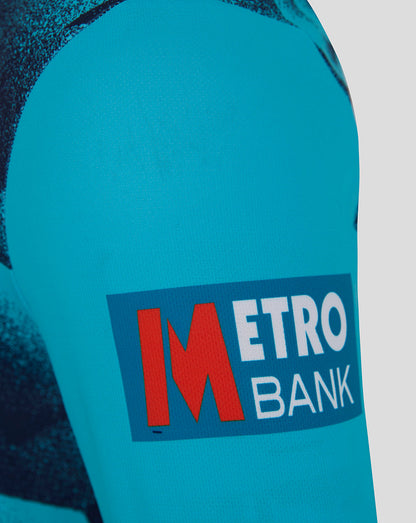 Close-up of a blue sports jersey with Metro Bank logo