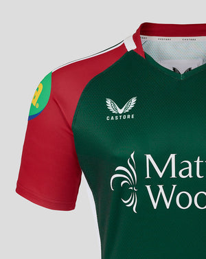 Close-up of the Leicester Tigers Junior 25/26 Pro Home Shirt chest area showing Castore logo and Mattioli Woods branding