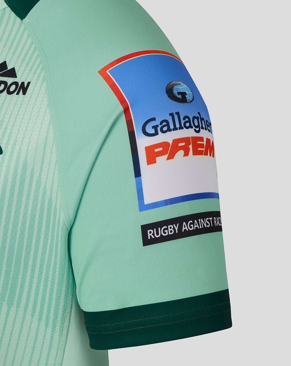 Close up of the sleeve with Gallagher PREM patch and Rugby Against Racism label on the mint Leicester Tigers Pro Away shirt