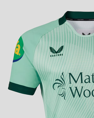 Close up of mint green Leicester Tigers Pro Away shirt showing shoulder seam diagonal stripe pattern and Mattioli Woods sponsor
