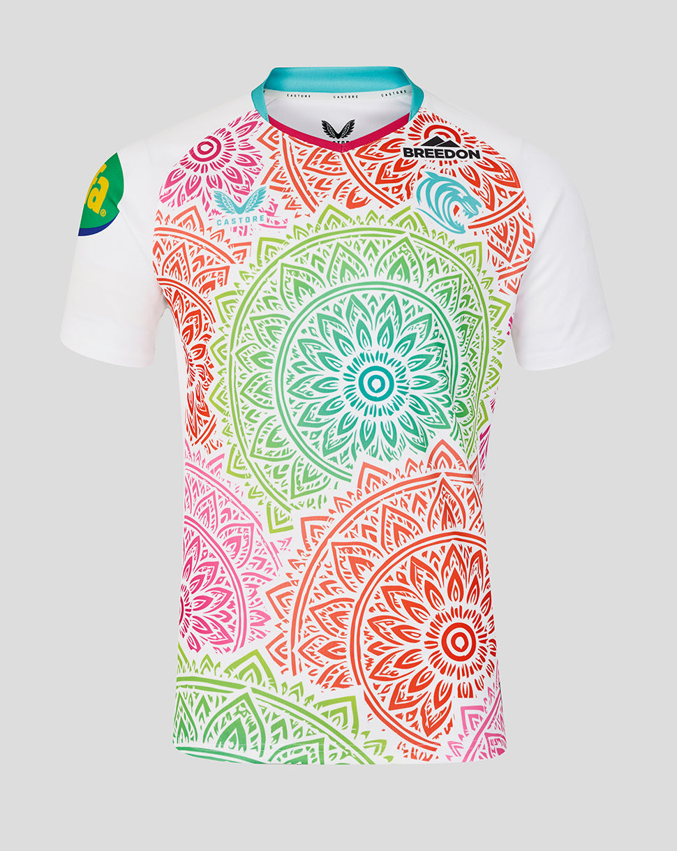 Colorful mandala patterned shirt on a white background
