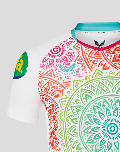 Colorful patterned shirt with the Castore logo on a white background