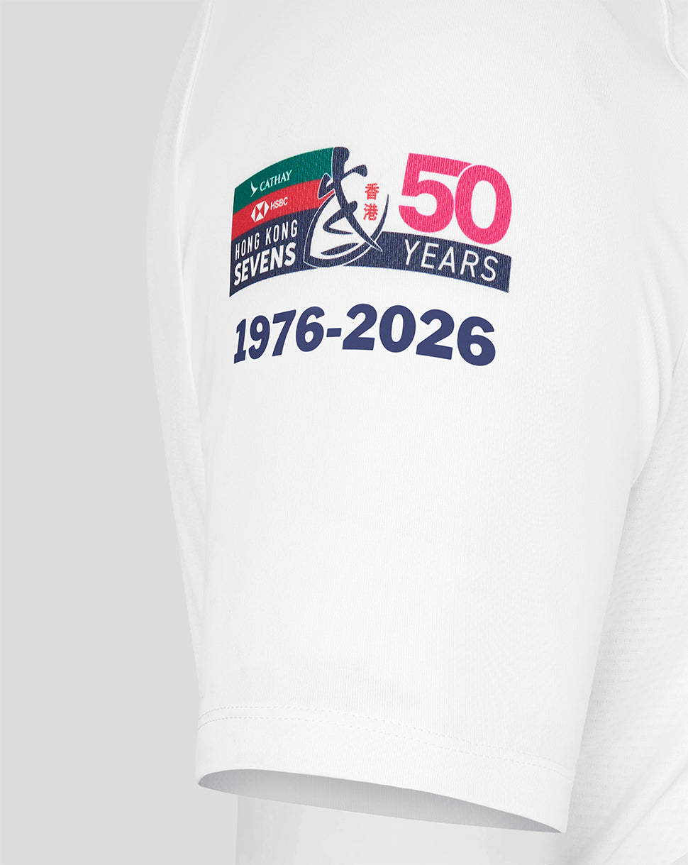 White Hong Kong China Rugby away jersey with navy polo collar featuring the 50 Years logo and a golden dragon crest.