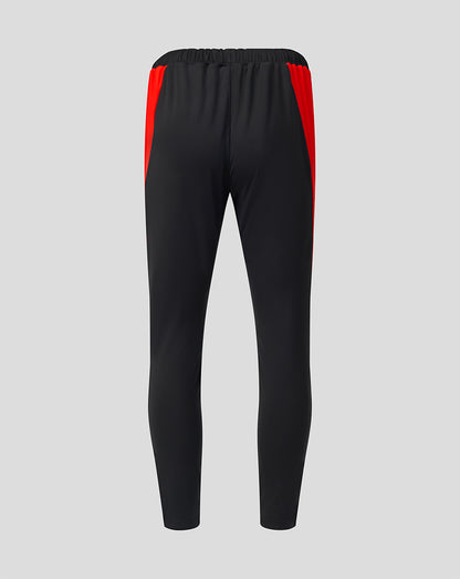Rear view of black Welsh Fire 100 Sub Slim Fit pant with red side panels