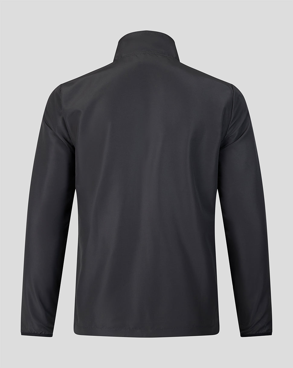 Back view of a dark Welsh Fire The Hundred 2026 woven pre match jacket