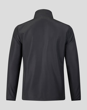 Back view of a dark Welsh Fire The Hundred 2026 woven pre match jacket