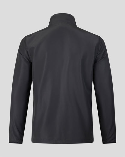 Back view of a dark Welsh Fire The Hundred 2026 woven pre match jacket