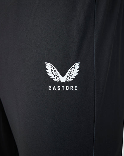 Close up of black Castore pant fabric with white wing logo