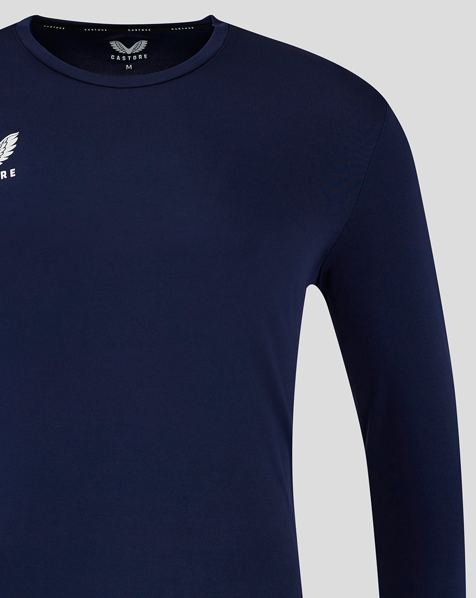 Detail of navy training shirt focusing on the shoulder and sleeve seam.