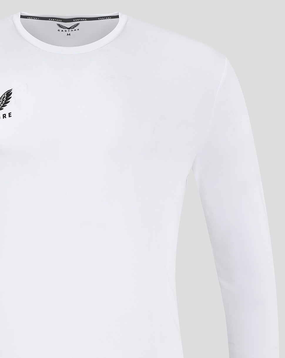Front view of a white long sleeve training T shirt with a small left chest logo.