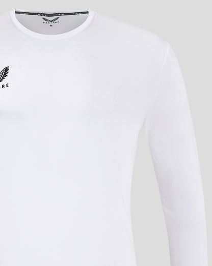 Front view of a white long sleeve training T shirt with a small left chest logo.