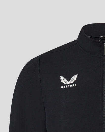 Close-up of the left chest showing the white Castore wing logo on a black track jacket