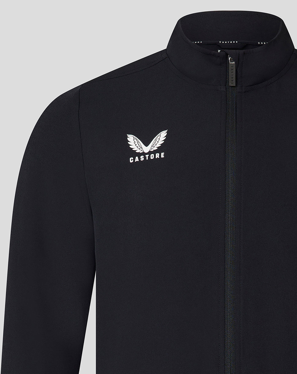 Close up of left chest showing the white wing CASTORE logo on a black zip jacket