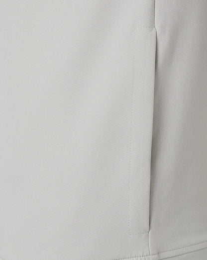 Center front zipper and neck seam on a light grey track jacket.