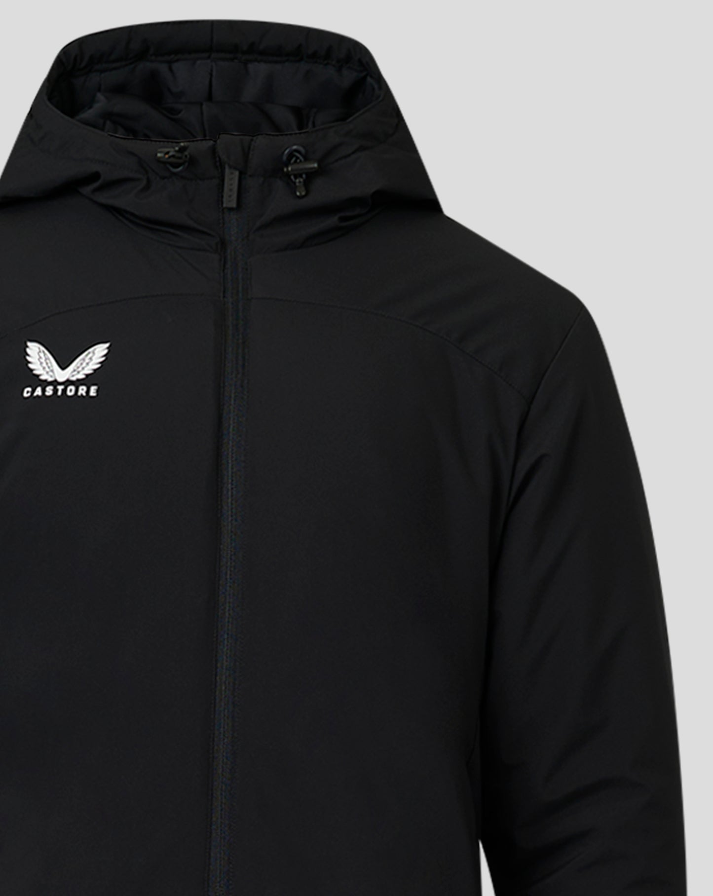 High collar with drawstrings and zipper on black bench jacket Castore logo on left chest