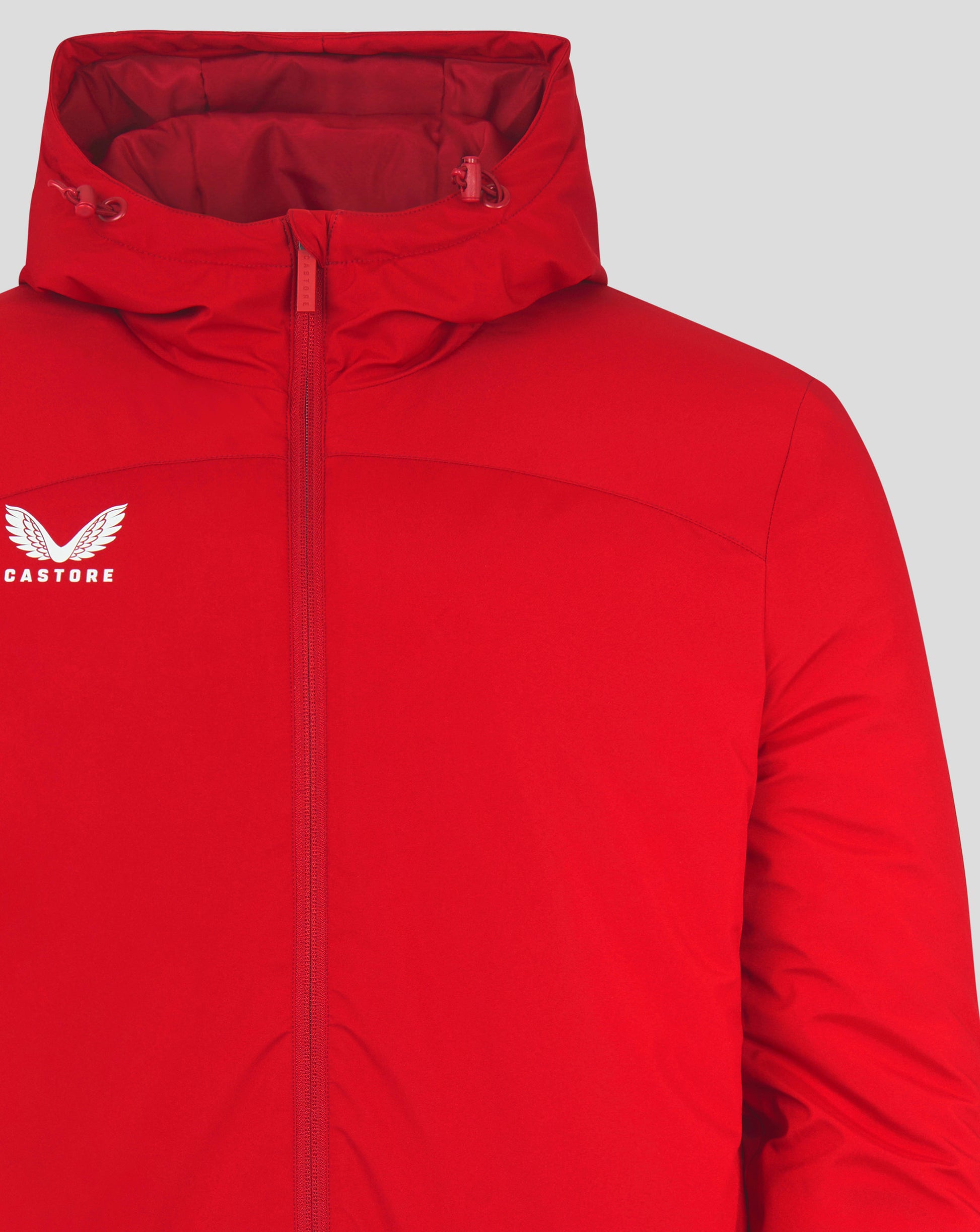 Front view of red Mens Bench Jacket with hood and full length zipper and Castore logo
