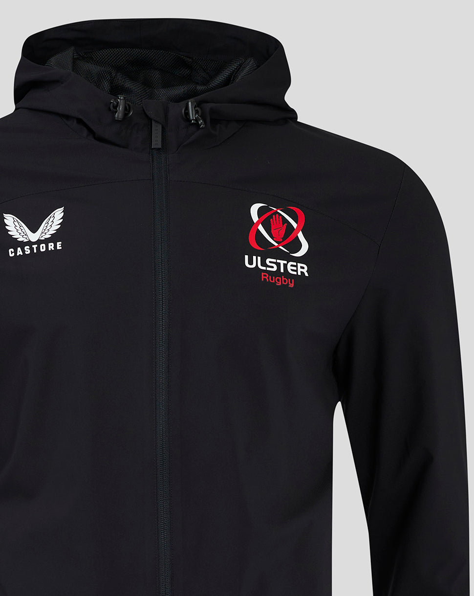 Close up of a black rain jacket chest area showing Castore logo on the left and Ulster Rugby crest on the right