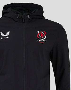 Close up of a black rain jacket chest area showing Castore logo on the left and Ulster Rugby crest on the right