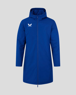 Front view of blue Castore mens long length bench jacket with white winged logo on chest and full zip