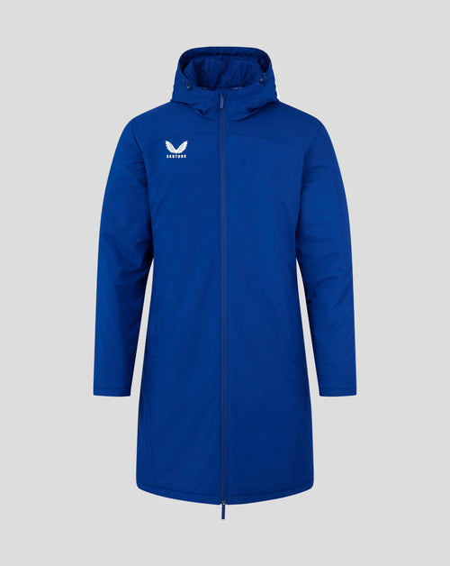 Front view of blue Castore mens long length bench jacket with white winged logo on chest and full zip