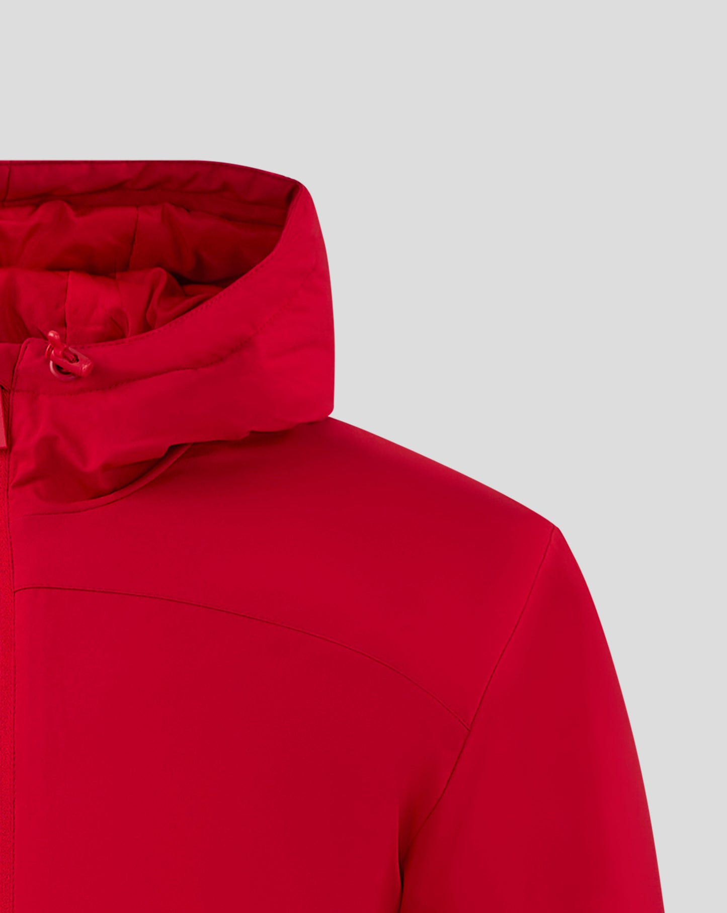Red hooded bench jacket shown from the front with the hood opening and zipper Castore logo on chest