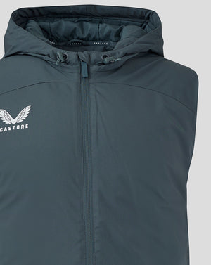 Close up of dark slate hooded gilet with centered zipper and white Castore wing logo on the left chest