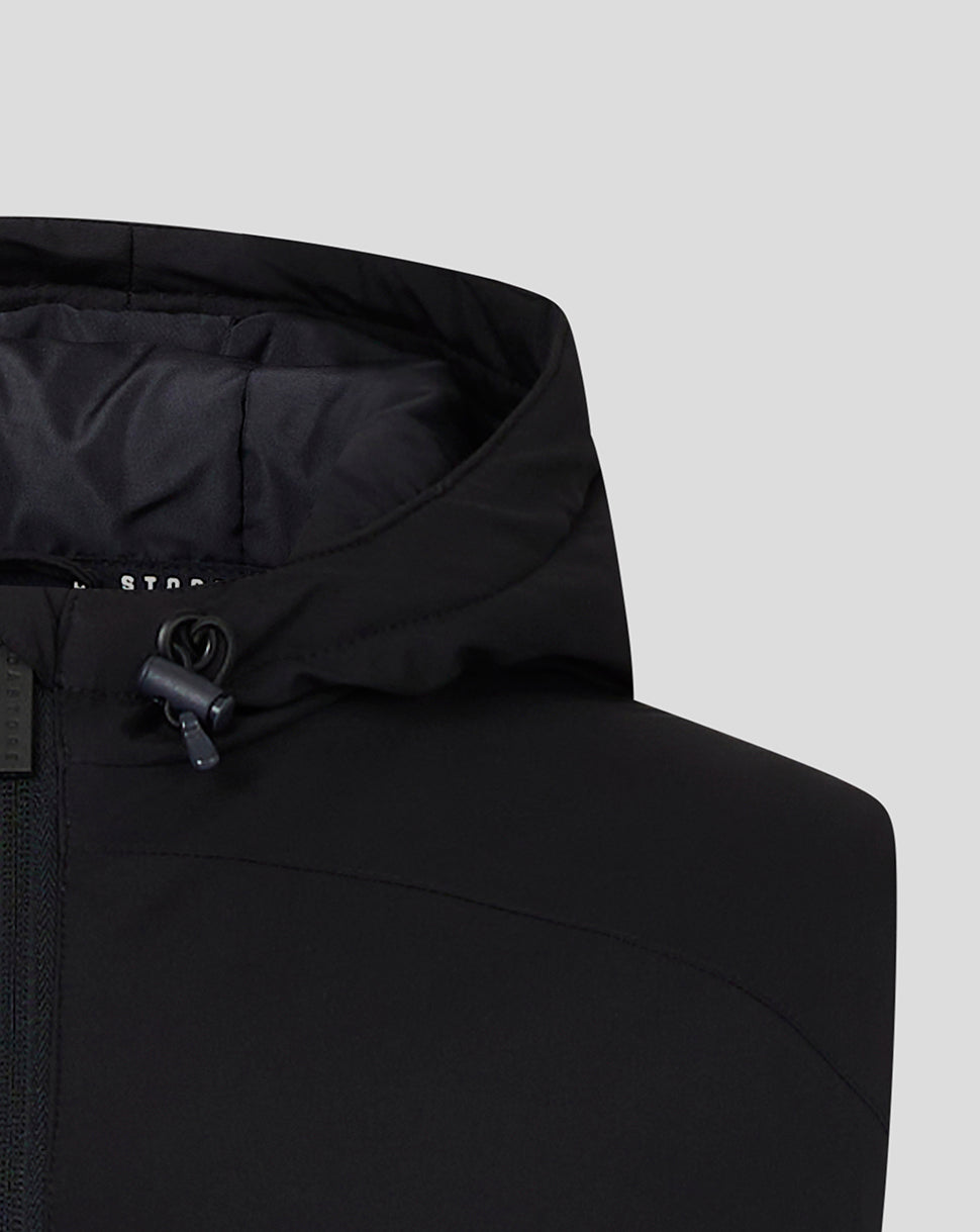 Close-up of the men's hooded gilet in caviar showing the hood drawstring toggle and front zipper