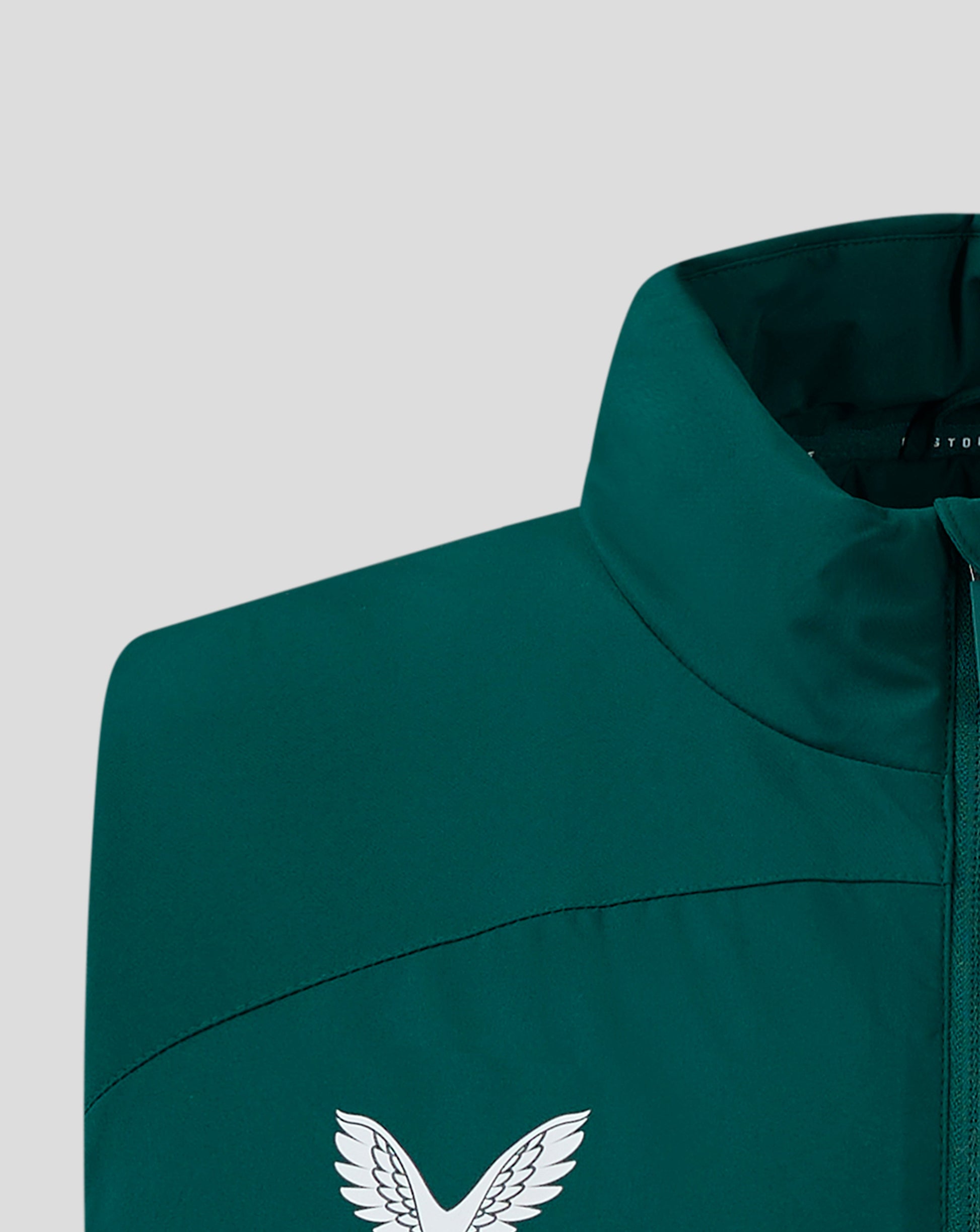 Teal padded gilet with a white wing emblem on the lower back area