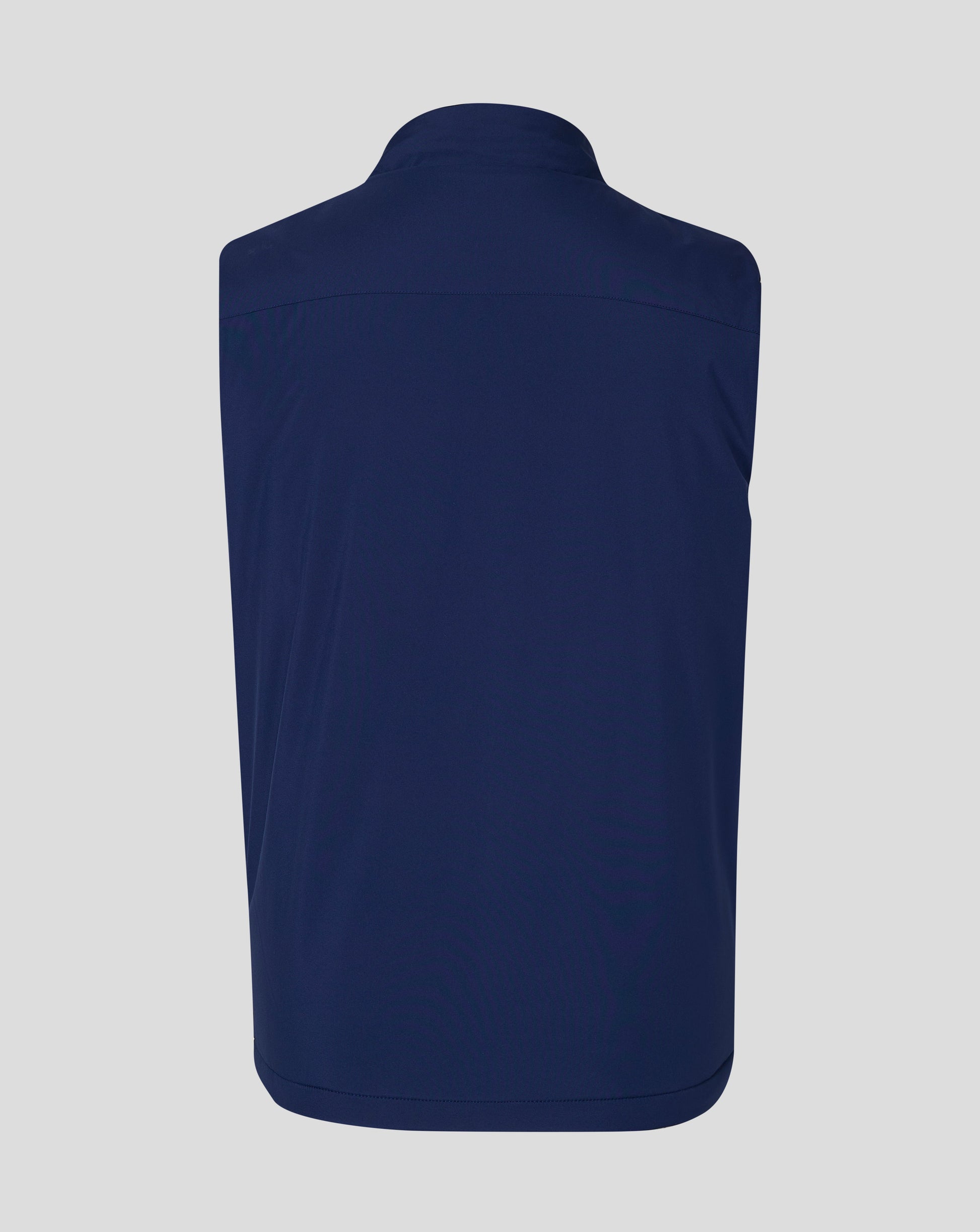 Back view of navy padded gilet with high funnel collar and curved yoke seam