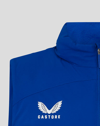Blue padded men’s gilet with funnel neck and white Castore logo on the chest.