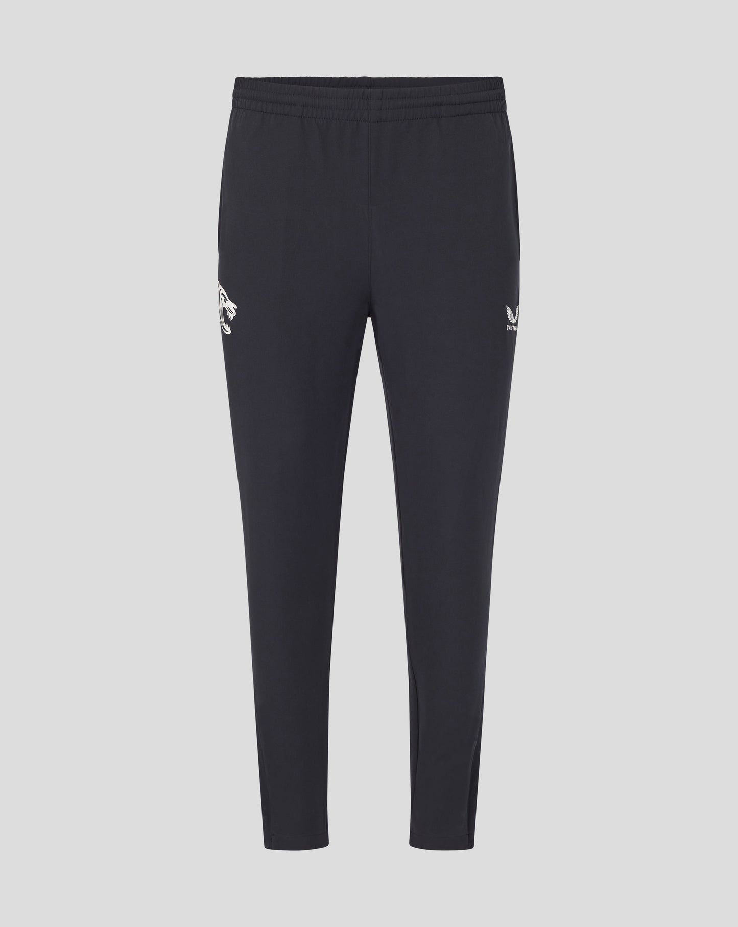 Front view of dark navy training track pants with a white tiger logo on the left thigh