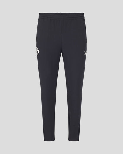 Front view of dark navy training track pants with a white tiger logo on the left thigh