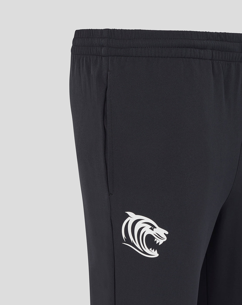 Side view of Leicester Tigers training track pants in dark navy with a white tiger logo on the leg.