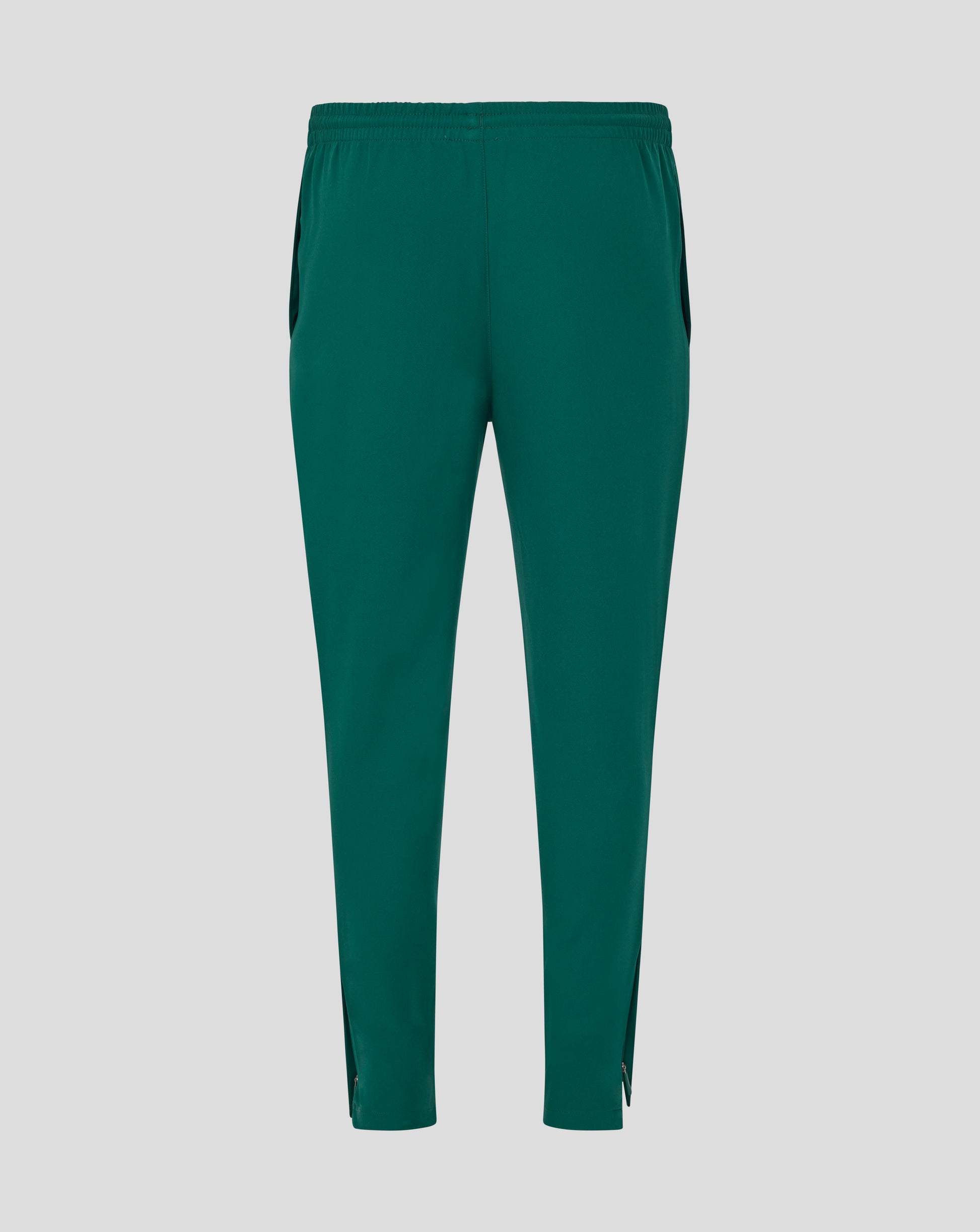 Full length view of green Botanical track pants with zip cuffs at the ankles