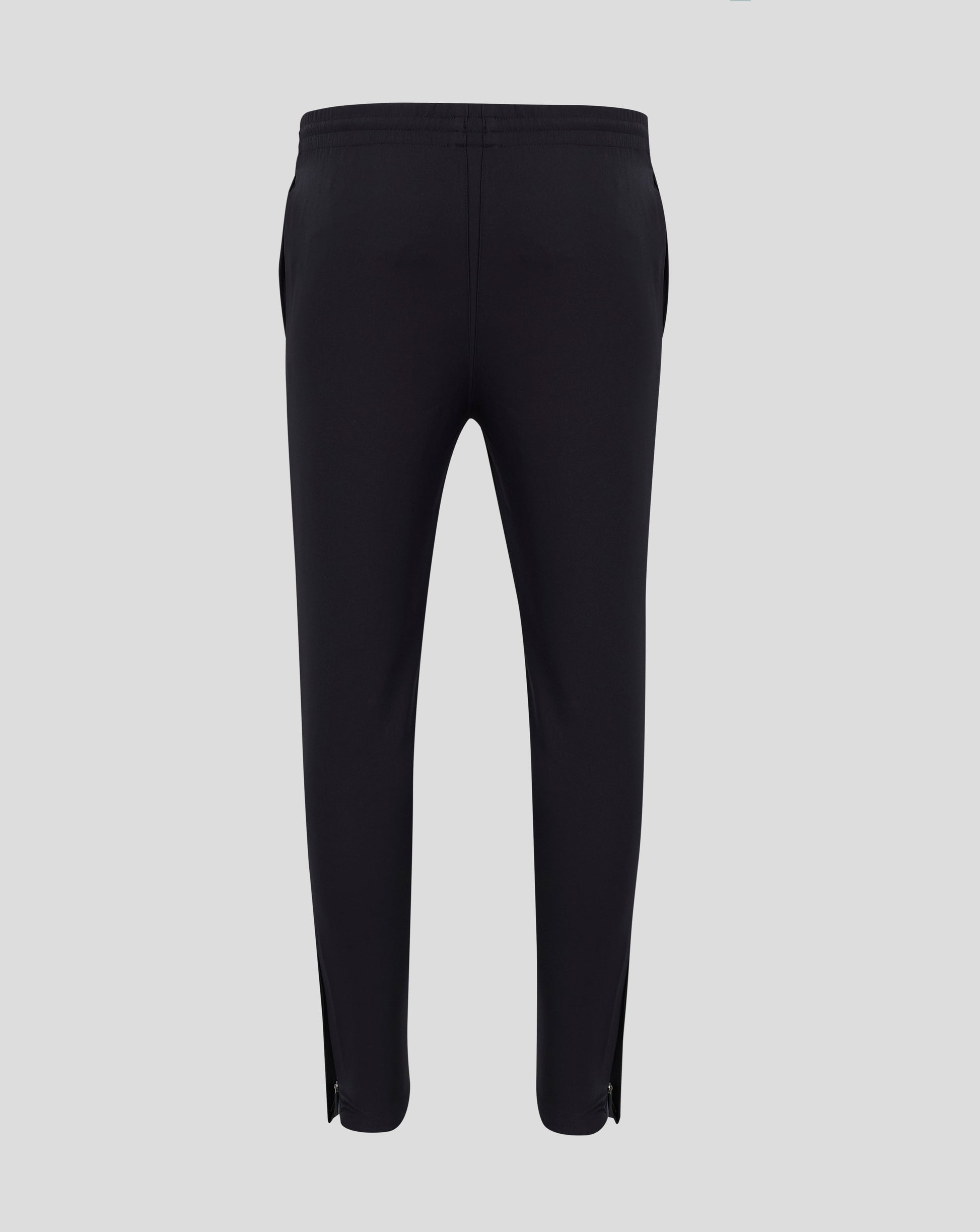 Rear view of black track pants showing elastic waistband
