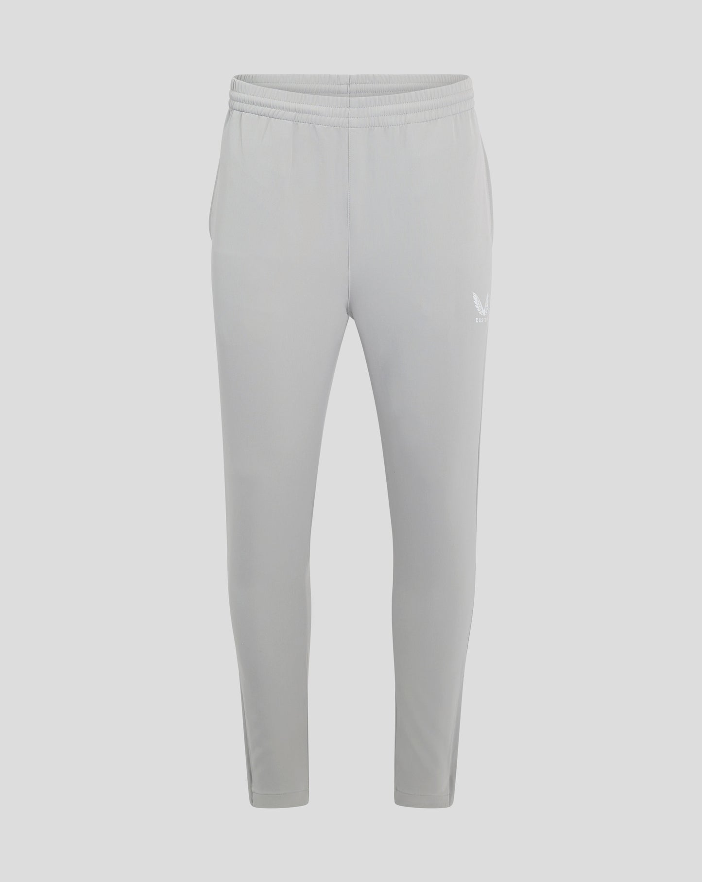 Back view of light grey track pants with elastic waistband and a small Castore wing logo at the thigh.