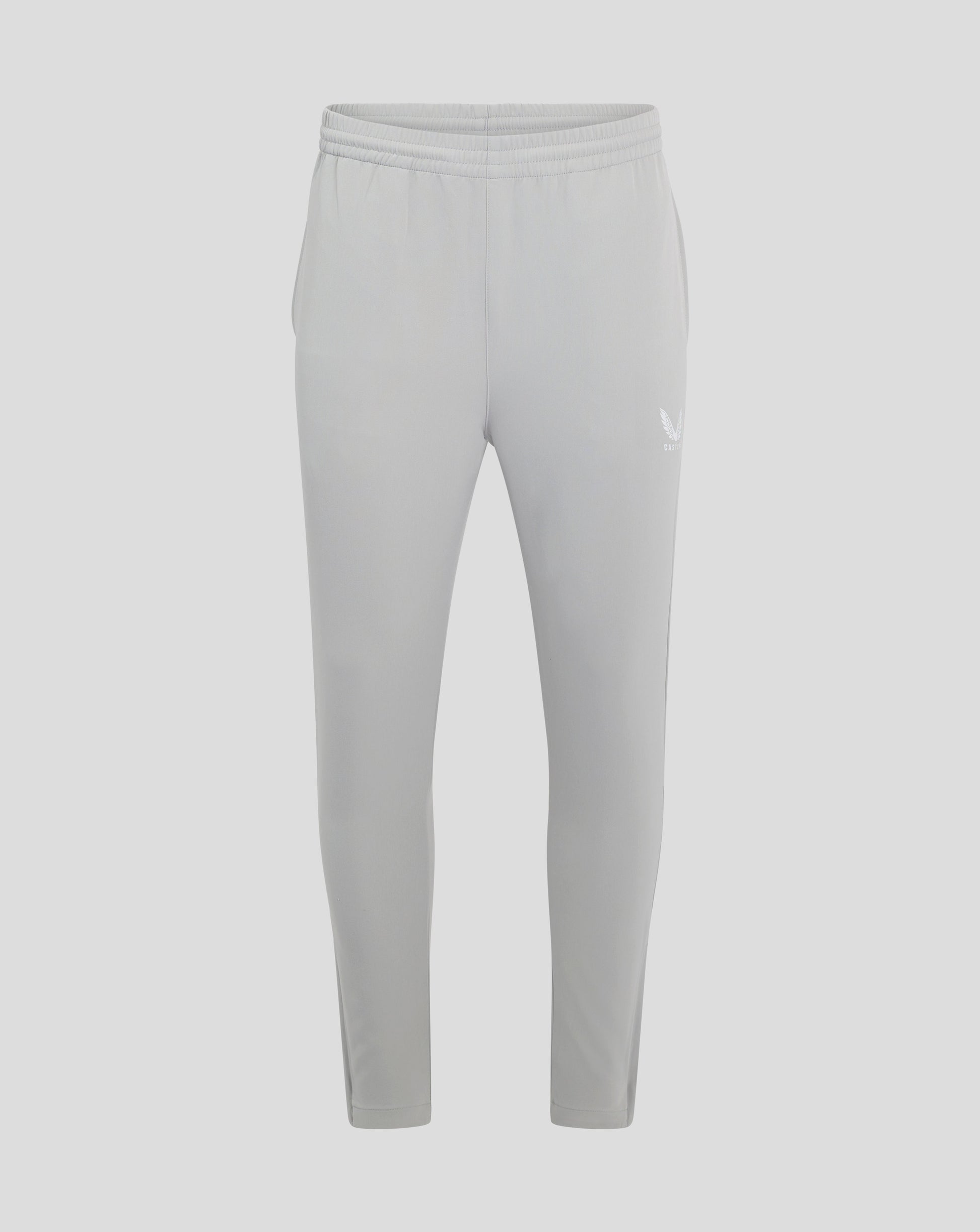 Back view of light grey track pants with elastic waistband and a small Castore wing logo at the thigh.