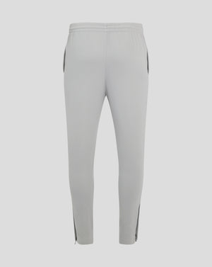Back view of light gray mens track pants with an elastic waistband and center seam