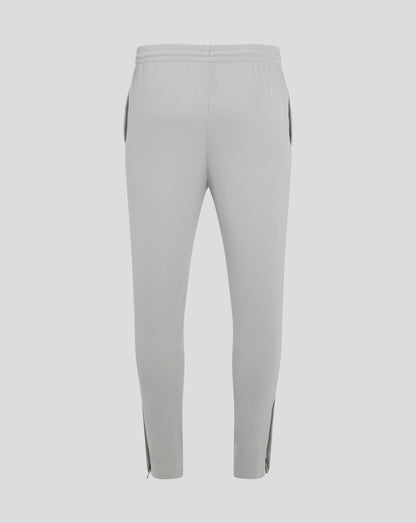 Back view of light gray mens track pants with an elastic waistband and center seam