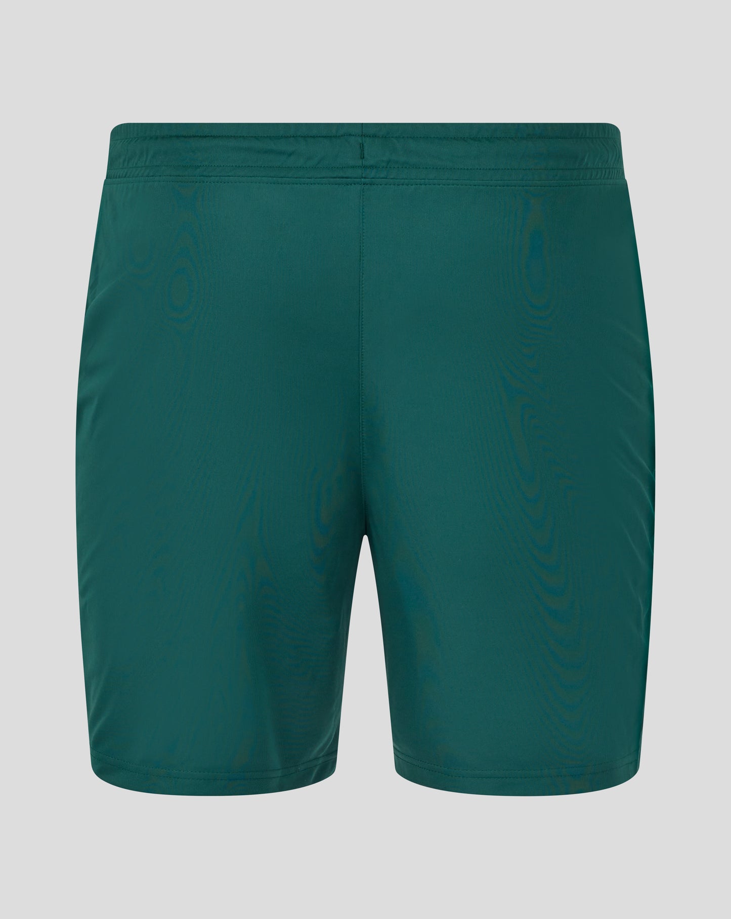 Front view of green botanical training shorts with white logos on each leg