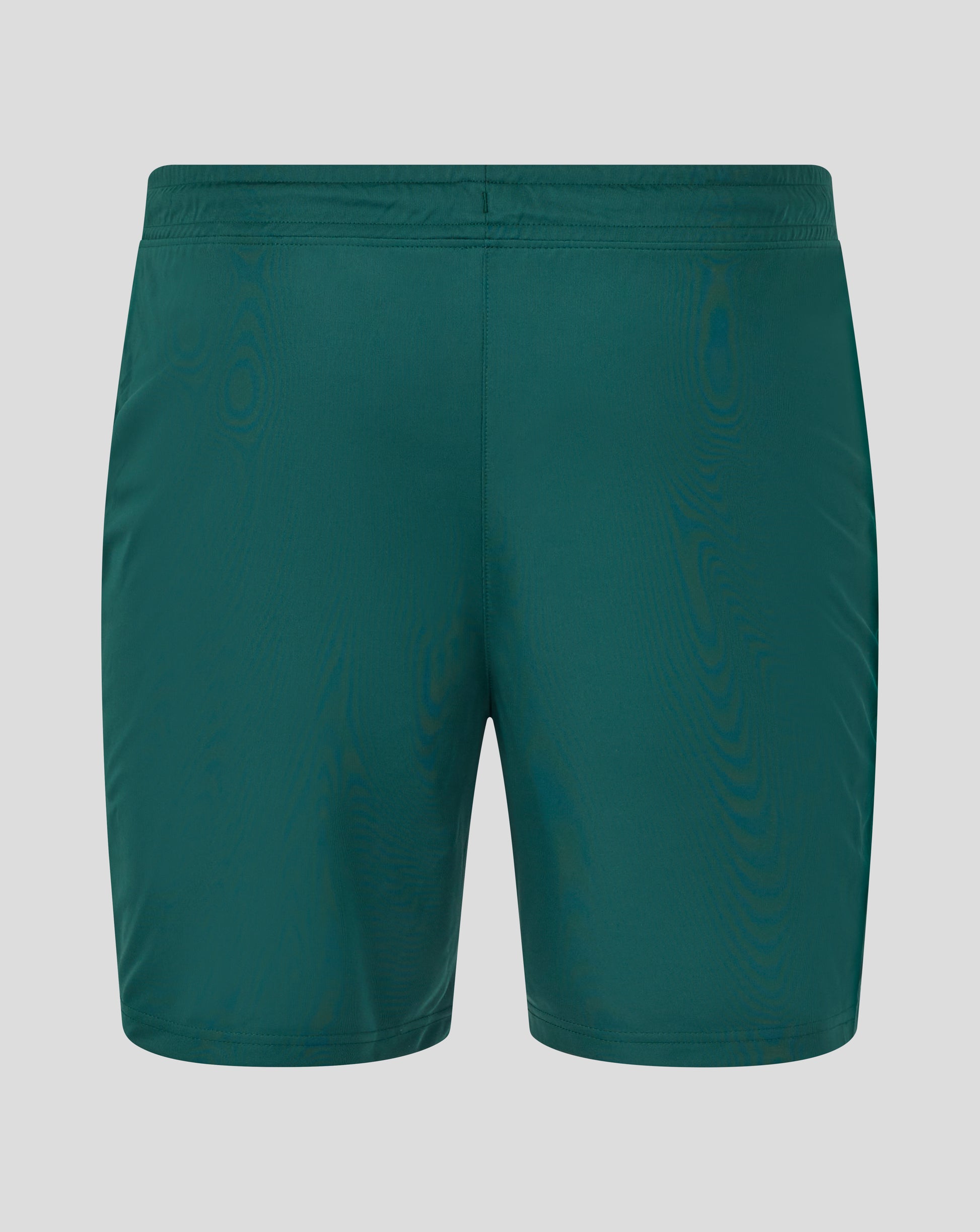 Front view of green botanical training shorts with white logos on each leg