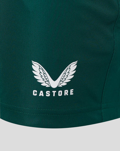 Close up of green botanical garden shorts fabric with an elastic waistband and heat sealed Castore logo
