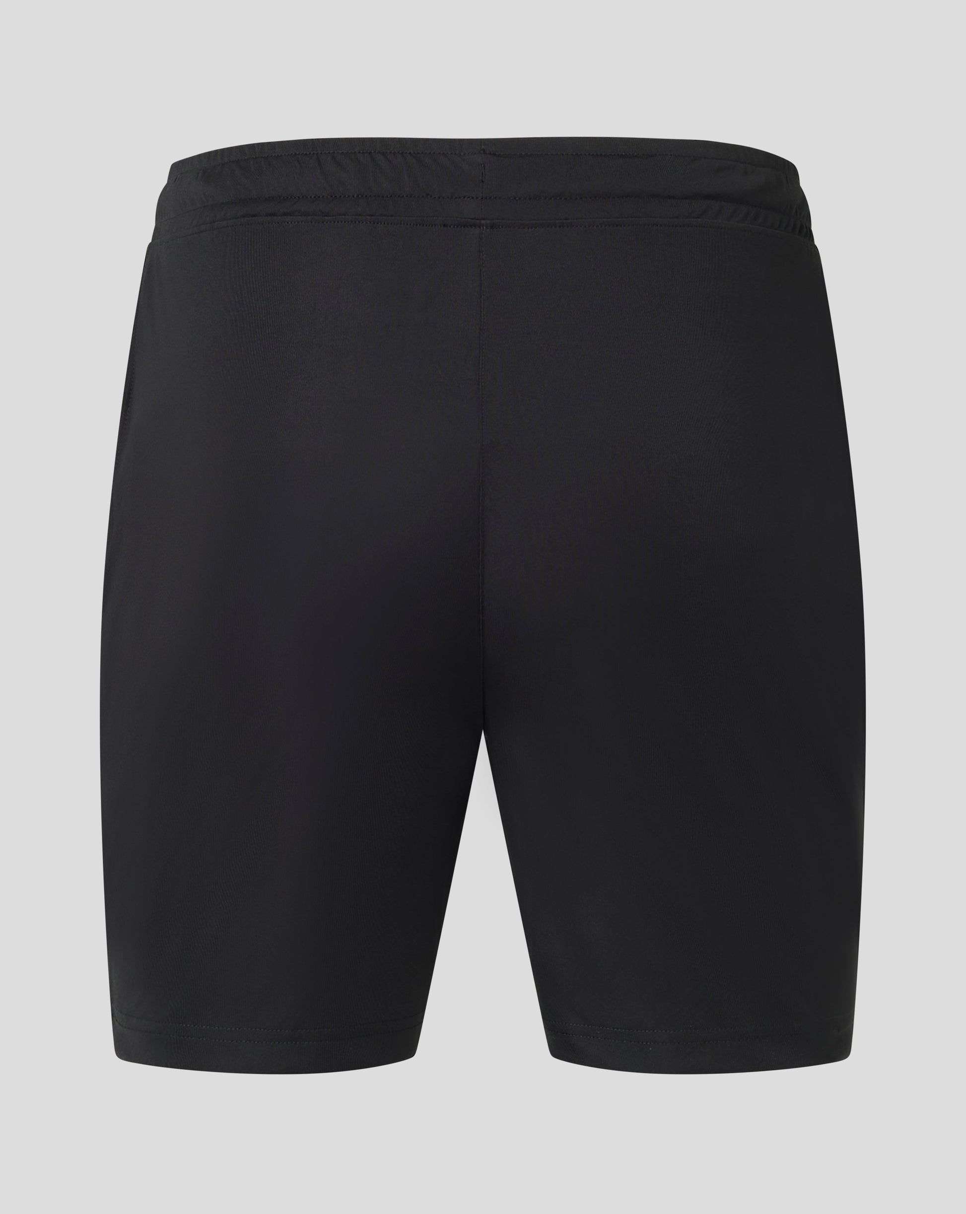 Back view of black Mens Match Short showing elastic waistband and small white Castore logo at the hem